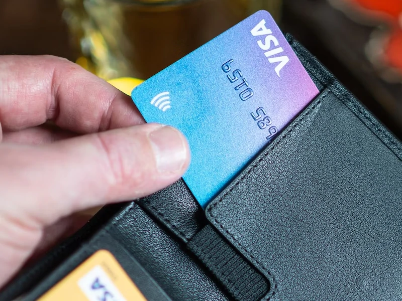 Visa card in wallet.